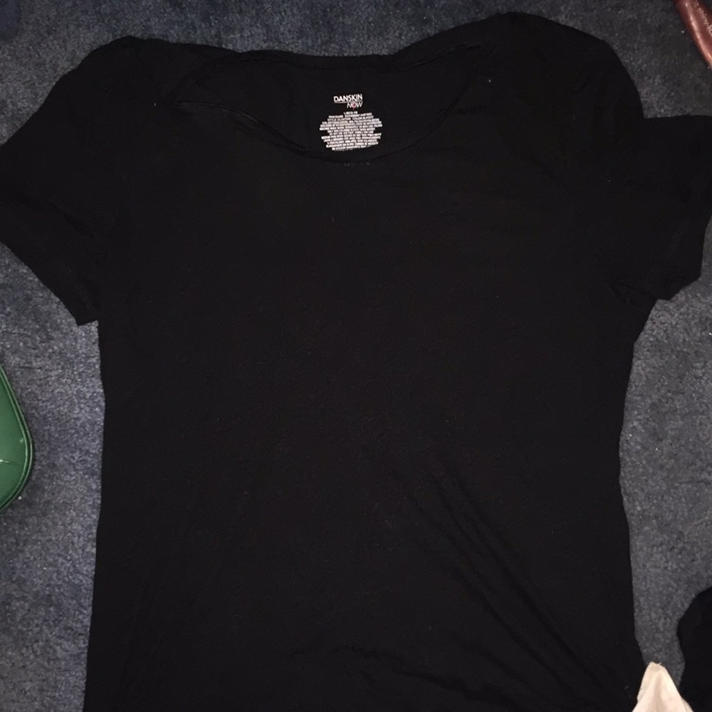 Black Shirt With A Flower Like Pattern